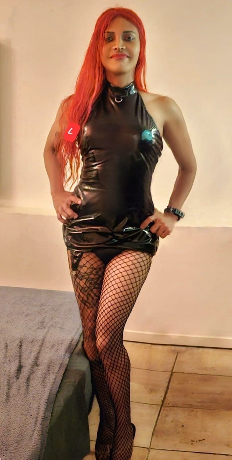 Escort DOMINANT 21CM REAL posing 5