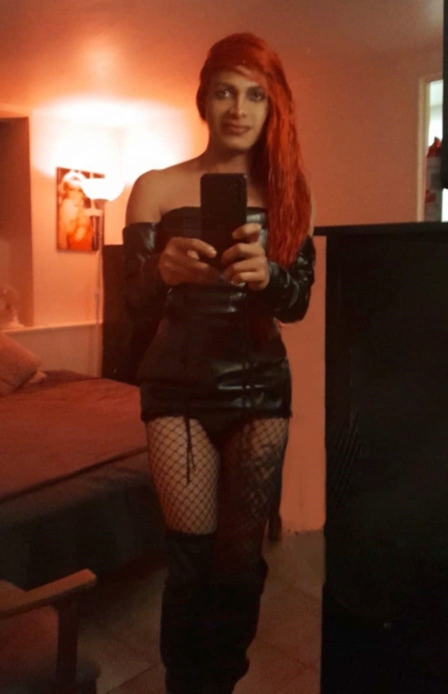 Escort DOMINANT 21CM REAL posing 4